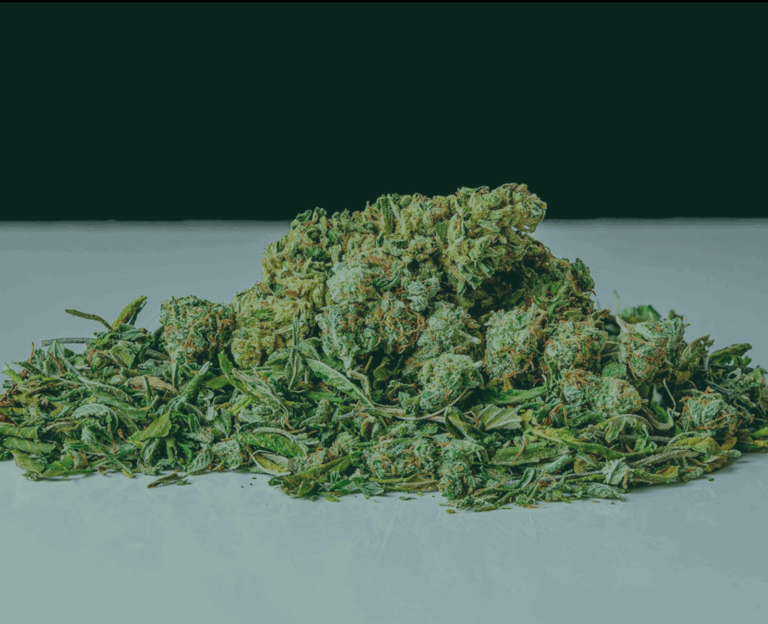 Shake weed on a white table with green overlay
