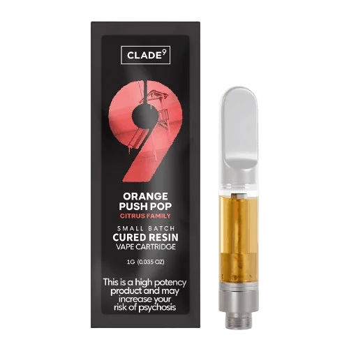 Clade9 Orange Push Pop vape cartridge and packaging, featuring a vibrant red-orange design with a citrus family label.